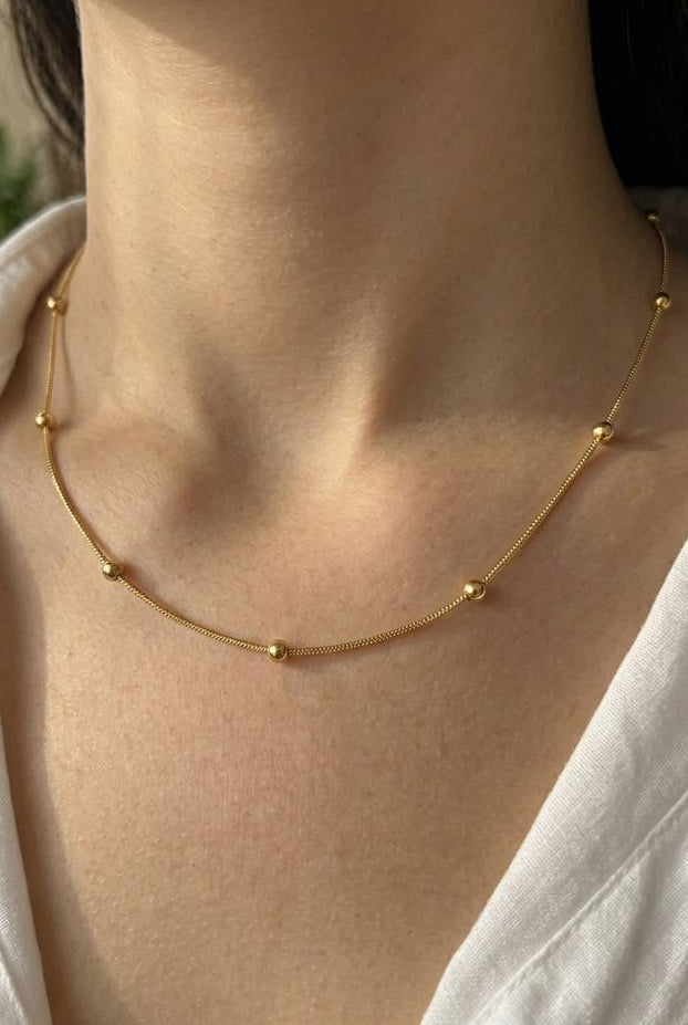 Gold beaded necklace
